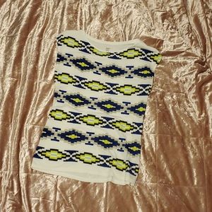 White tee with geometric pattern